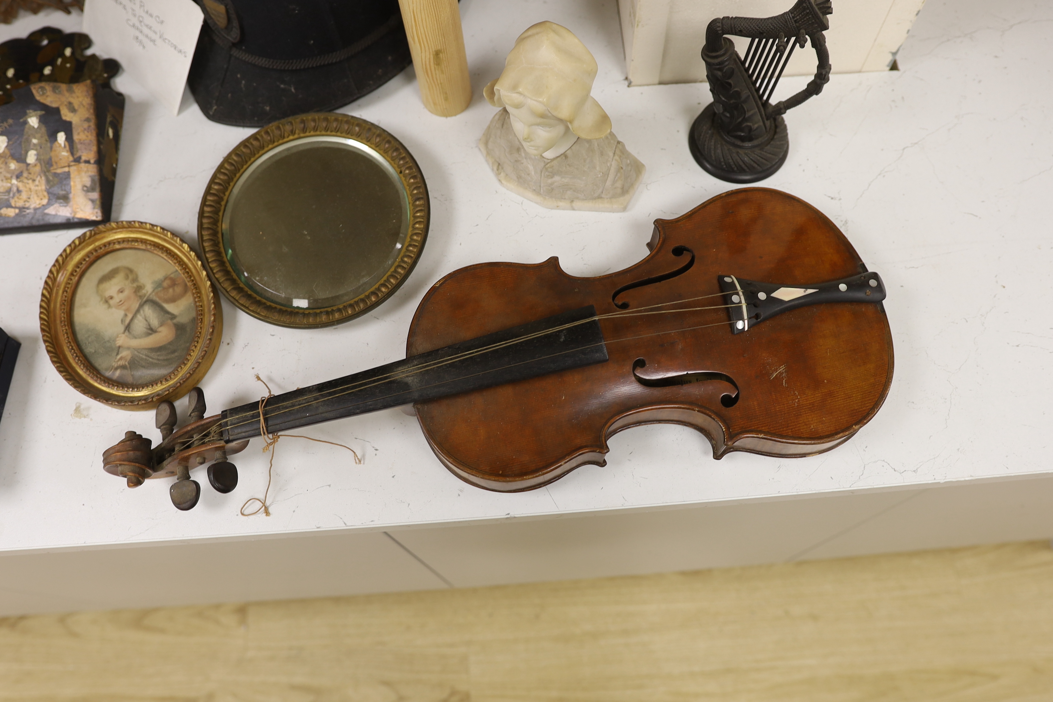 Mixed collectables - An early 20th century violin, interior label reads ‘Nicolaus Amatus fecit in Cremona 1651 Made in Czechoslavia’, an QEII General Service medal, CANAL ZONE bar, to AC1 P G DARLINGTON (2523204) RAF, a